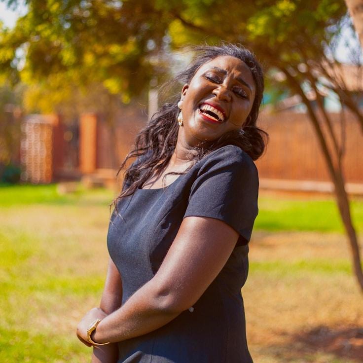 Kaveri Mehta, Lead Design Curator at IsleSectorDomain, reviewing corporate floral arrangements